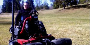 Greenkeeper at work on Toro mower Greenmaster